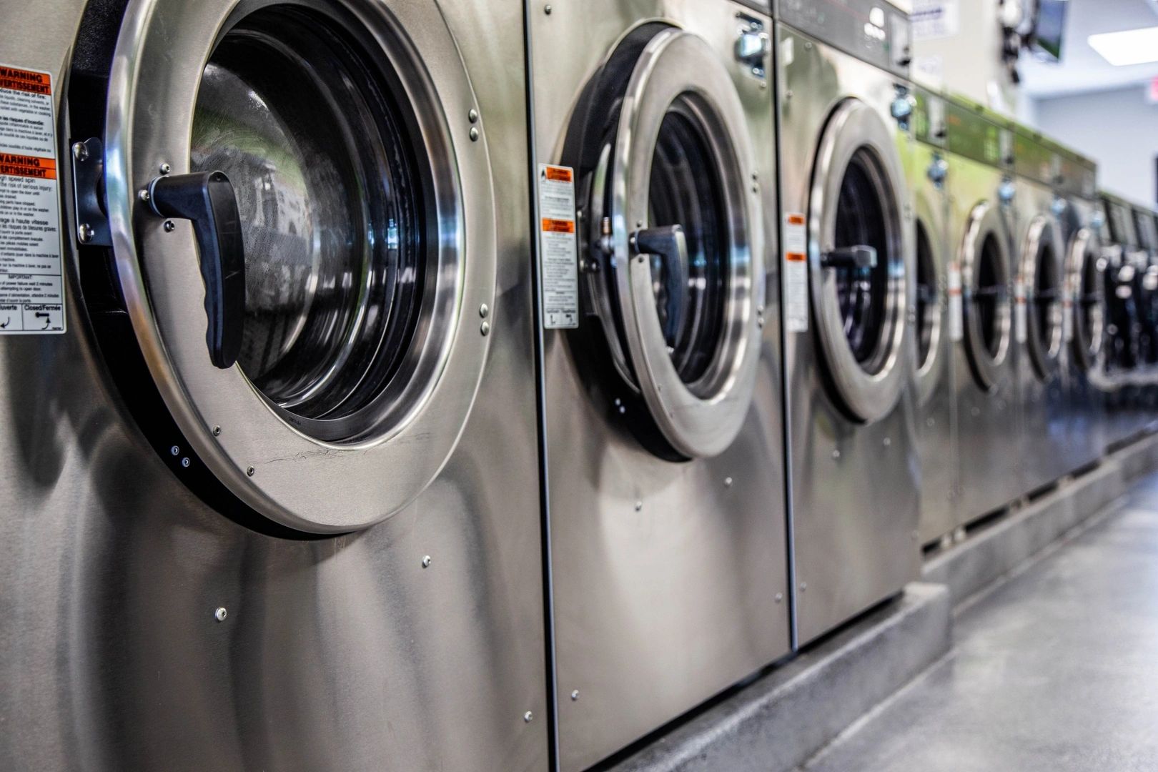 Inside the Uptown Laundry laundromat in Sioux Falls, SD — rows of clean, modern washers and dryers